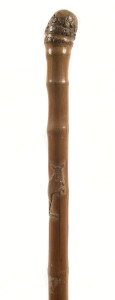 A Japanese walking stick, bamboo shaft with carved kangaroo, circa 1900, 89cm long