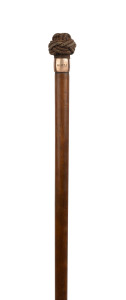 A sailor's walking stick with Turkman's knot rope handle, rose gold plated collar engraved "MURTLE" and timber shaft, 19th century, missing ferrule. 83cm high