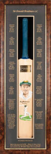 DON BRADMAN, attractive display with signature on full size Cricket Bat, with hand-painted portraits on face of blade, and Bradman's record on mount, in attractive display case (crack in glass), overall 36x109cm. With CoA.