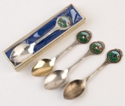 VFL FOOTBALL SPOONS: silver plated souvenir picture&nbsp;spoons (4)&nbsp;with enamelled&nbsp;images of footballers at tops of the handles, two in blue guernseys with black shorts (one in original box, as new), one in blue guernsey with white shorts, the other in red gue