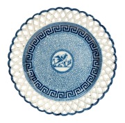 An antique English pierced blue and white pottery plate with sphinx vignette and Greek key border, circa 1820, 21.5cm wide