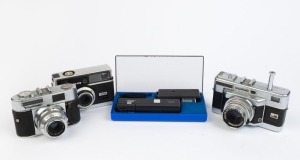 VOIGTLÄNDER: Group of four cameras - one c. 1956 Vitessa T, one c. 1957 Vito BL, one c. 1968 Vitessa 126 CS, and one c. 1978 Vitoret 110 EL in presentation case with flash attachment. (4 cameras)