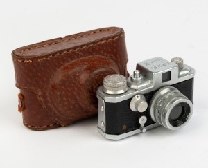 MORITA TRADING: Kiku 16 Model II subminiature camera, c. 1956, with matching leather case.