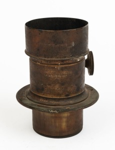 MAUGEY AINÉ: Brass petzval lens with engraving that reads 'Maugey Ainé Opticien Paris', c. 1870s. Focal length approx. 9.5cm, lens diameter approx. 5.5cm, total length approx. 15cm.