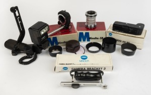 MINOLTA: Accumulation of ten Minolta accessories, four of which in maker's box - one Extension Bellows for Minolta-SR, one Extension Tube for Minolta-SR, one Camera Bracket 2, one Auto-Winder AW-90, four different metal lens hoods, one Minolta Auto 280PX 