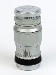 LEITZ: Elmar 90mm f4 screw-mount lens [#720812], with front and rear caps.