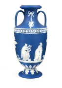 WEDGWOOD antique English blue Jasper Ware&nbsp;pottery vase in the Portland style, adorned with classical muses in relief, circa 1800, impressed "WEDGWOOD", 20cm high