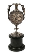 An impressive antique English electrotype cast bronze urn, adorned with maidens, wreaths and angel vignettes, mounted on bands hardstone base, engraved "ART UNION OF LONDON, 1863", 27cm high