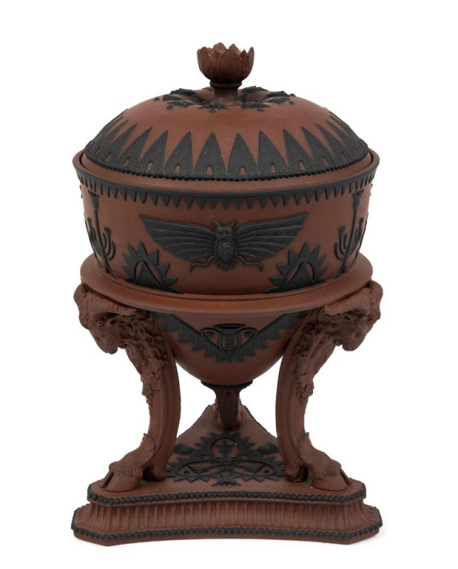 WEDGWOOD rare rosso antico English covered pot pourri with basalt Egyptian relief, tripod legs and goats head decoration, circa 1810, impressed "WEDGWOOD", 23cm high