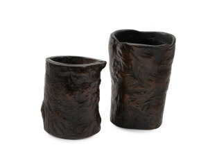 Two antique Chinese rootstock timber brush pots, 18th/19th century, 9cm and 12cm high