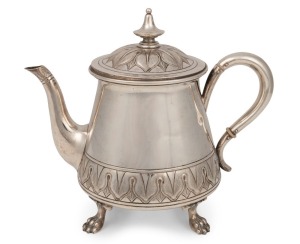 An antique German 800 silver teapot with engraved leaf decoration and claw feet, early 20th century, crown and crescent mark to base, 21cm high, 724 grams total