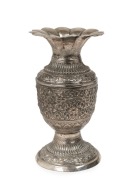 An antique Asian silver vase with floral repousse decoration, 19th/20th century, 24cm high, 594 grams