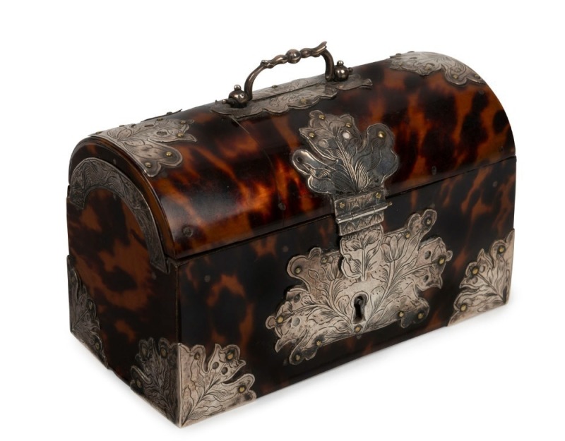 An antique English tortoiseshell moneybox casket with dome-top and silver mounts, interior lined in water washed scarlet silk, 18th/19th century, ​​​​​​​9cm high, 13cm wide, 6.5cm deep