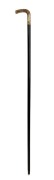 An antique walking stick with yellow gold plated handle with engraved decoration on an ebony shaft with steel ferrule, 19th century, 90cm high