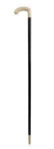 An antique walking stick with ivory handle, ebony shaft and ivory ferrule, 19th century, 86cm high