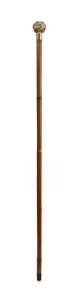 An antique walking stick with Japanese carved ivory handle, 18ct yellow gold collar, bamboo shaft and iron ferrule, 19th century, 90cm high
