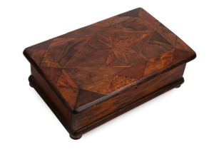 WILLIAM NORRIE antique New Zealand box inlaid with various native New Zealand timbers, late 19th century, together with a William Norrie business card with hand-drawn key to the timbers on the reverse, 10cm high, 30cm wide, 19cm deep