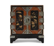 An antique Japanese miniature two door cabinet with gilt lacquer finish, Meiji period, 19th century, ​​​​​​​15cm high