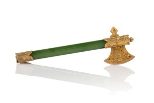 An antique New Zealand greenstone axe brooch with engraved 9ct gold mounts, 19th century, 5.5cm long