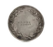 1879 ALBURY INDUSTRIAL EXHIBITION silver medal by Stokes & Martin, 47mm, awarded to E.T. POWEL(L) for the "Best collection of native weapons, jury prize." Impressed "ALBURY INDUSTRIAL EXHIBITION" around edge. - 2