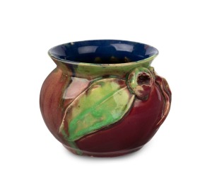 REMUED pottery vase with applied gumnuts and leaf, glazed in pink and green with blue interior, incised "Remued, Hand Made 57/M", 9cm high, 12cm wide