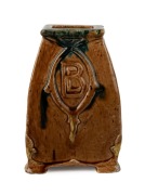 HARVEY SCHOOL pottery vase, square tapering form with brown and green glaze, incised "M. M., 1929" 15cm high
