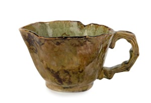 JOLLIFF large hand-built pottery jug with unusual green and brown glaze, incised "Jolliff, Hand Built, FEC, 1943", 12cm high, 23cm wide