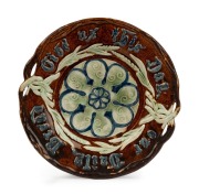 BENDIGO POTTERY circular bread platter glazed in green, blue and brown, 19th century, 27.5cm wide