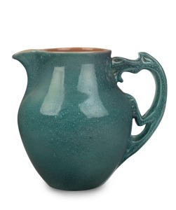 KLYTIE PATE turquoise glazed pottery jug with dragon handle, incised "Klytie Pate", 21cm high, 23cm wide