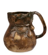 PEGGY WHITING green and brown glazed pottery jug with applied fruit and branch handle, incised "Peggy Whiting", 16cm high