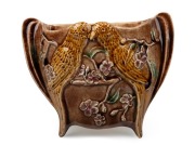 M. L. McLEAN (HARVEY SCHOOL) pottery wall pocket with applied birds and blossoms, incised "Hand built M.L. Mclean" with incised glazing notes verso, 18cm high, 22cm wide.
