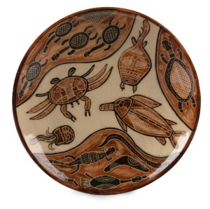 CARL COOPER pottery dish with Aboriginal animal designs, incised "Carl Cooper, Australia, 1950", 19.5cm diameter