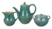 KLYTIE PATE pottery tea service comprising of teapot, jug and sugar basin, incised "Klytie Pate", the teapot 20cm high x 23 cm wide