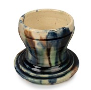 An Australian Colonial pottery butter pot with mottled blue glaze on cream ground, 19th century, ​​​​​​​9cm high, 11cm diameter
