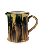 P.P.P. (PRESTON PREMIER POTTERY) jug with dribble glaze, stamped "PPP", 13cm high, 15cm wide