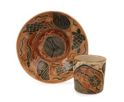 CARL COOPER pottery coffee beaker and saucer, (2 items), incised "Carl Cooper", the beaker 5.5cm high, the saucer 13cm diameter