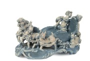 GWEN WATSON pottery bowl adorned with cherubs and classical figures, goats and swags, glazed in blue and cream, 17.5cm high, 32cm wide