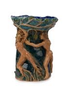 ARTIST UNKNOWN "Adam and Eve" hand-built pottery vase with applied decoration, monogram cartouche near base "C.I.P.", 25cm high