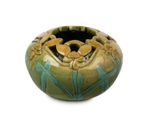 FLORA LANDELLS donkey orchid pottery vase with green glaze, incised "DONKEY ORCHID, LANDELLS, PERTH", 6cm high, 10cm wide.