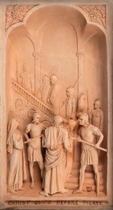 GEORGE TINWORTH "Christ Going Before Pilate" antique pottery wall plaque, 19th century, titled in the lower margin with artist's monogram, housed in original ebonised frame, 47 x 30cm overall