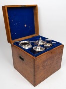 An antique English four piece sterling silver tea service with engraved decoration, housed in original fitted oak case, manufactured by Thomas Shepherd of London, circa 1877, the largest 30cm high, 2388 grams total - 2