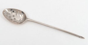 An antique English sterling silver mote spoon with fancy back, 18th century, 13cm long