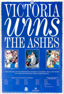 "VICTORIA wins The Ashes" poster signed by Merv Hughes, Paul Reiffel & Shane Warne, framed & glazed, overall 55x80cm.