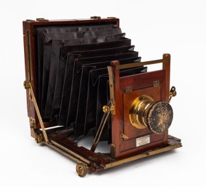 WATSON & SONS: 4¾ x 6½" plate field camera, c. 1885, with Beck Symmetrical lens and lens cap.