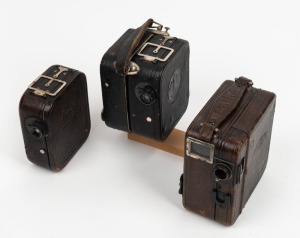 PATHÉ: Three c. 1920s 9.5mm movie cameras - one Pathé Baby Motor, one Pathé Baby, and one Pathé Moto Camera. (3 movie cameras)