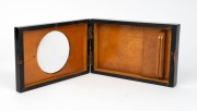 21 x 14 x 4cm folding graphoscope with magnifier lens, photograph holder, and carved floral decorative pattern that reads 'Souvenir de Paris'. - 2