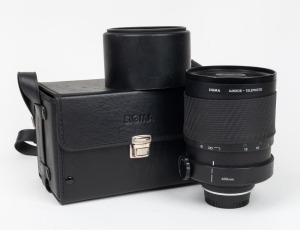 SIGMA: Mirror-Telephoto 600mm f8 lens [#1039692], with metal lens hood and leather case.