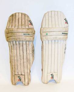 STUART LAW, pair of cricket pads & pair of batting gloves, both signed & marked "Shield Final 94-95"; plus two other pairs of signed batting gloves & signed Queensland One-Day uniform (shirt with tone spots). Fair/Good condition. [Law captained Queensland