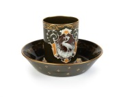 MINTONS antique English p&acirc;te-sur-p&acirc;te green porcelain coffee cup and saucer, 19th century, (2 items). factory stamp to base, the cup 6.5cm high