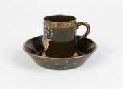 MINTONS antique English p&acirc;te-sur-p&acirc;te green porcelain coffee cup and saucer, 19th century, (2 items). factory stamp to base, the cup 6.5cm high - 2